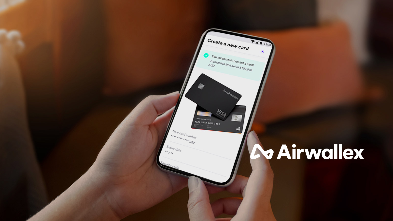 Airwallex app on a mobile phone and Airwallex logo on the right side of the mobile phone image.